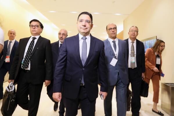 Moroccan Foreign Minister Nasser Bourita, center, arrives for a preparatory meeting before the beginning of the Arab Summit in Algiers, Algeria, Monday, Oct. 31, 2022. Algeria is readying to host the 31st Arab League Summit, the first since the outbreak of the coronavirus pandemic. In the three years that's passed, new challenges have drastically reshaped the region's agenda, with the establishment of diplomatic ties between Israel and the gulf, and the fallout of the war in Ukraine. (AP Photo/Anis Belghoul)