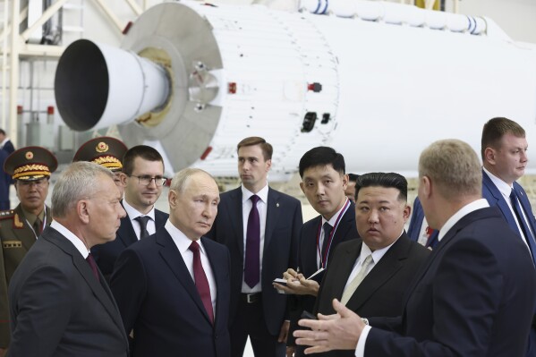 FILE - Russian President Vladimir Putin, second left in front, and North Korea's leader Kim Jong Un, second right in front, examine a rocket assembly hangar during their meeting at the Vostochny cosmodrome outside the city of Tsiolkovsky, about 200 kilometers (125 miles) from the city of Blagoveshchensk in the far eastern Amur region, Russia on Sept. 13, 2023. North Korea has likely supplied several types of missiles to Russia to support its war in Ukraine, along with its widely reported shipments of ammunition and shells, South Korea’s military said Thursday, Nov. 2, 2023. Russian Federal Space Corporation Roscosmos CEO Yuri Borisov is on the left. (Artyom Geodakyan, Sputnik, Kremlin Pool Photo via AP, File)