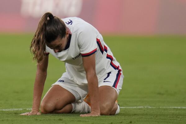 United States' Tobin Heath reacts after losing 0-3 against Sweden during a women's soccer match at the 2020 Summer Olympics, Wednesday, July 21, 2021, in Tokyo. (AP Photo/Ricardo Mazalan)