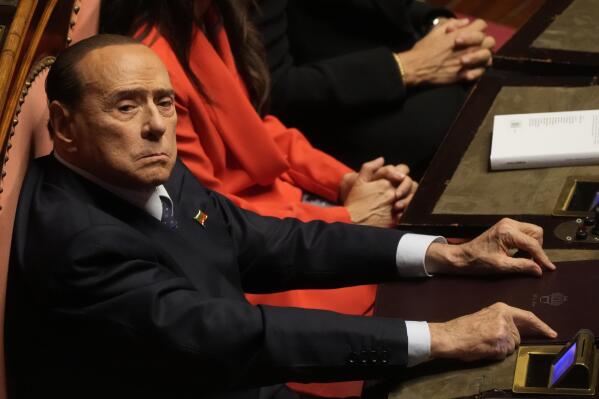 FILE - Forza Italia's president Silvio Berlusconi takes his seat in the Italian Senate on the opening session of the new parliament, Thursday, Oct. 13, 2022. Doctors for Italian former Premier Silvio Berlusconi say he is being treated in hospital for a lung infection that is a result of chronic leukemia. Berlusconi’s personal physician, Alberto Zangrillo, signed off on a medical bulletin issued Thursday, April 6, 2023 afternoon that said Berlusconi “has had for some time” leukemia in a “persistent chronic phase.” (AP Photo/Gregorio Borgia, file)
