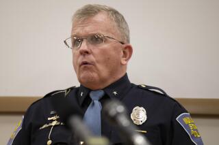 FILE - Indiana State Police Superintendent Doug Carter responds to questions at a news conference in Indianapolis, Nov. 10, 2020. Police officers across the state are having to change how they handle encounters with armed people as a repeal takes effect Friday, July 1, 2022, of Indiana's requirement for a permit to carry a handgun in public, a move that Carter argued would endanger officers by stripping them of a screening tool for quickly identifying dangerous people who shouldn't have guns. (Colin Boyle/The Indianapolis Star via AP File).