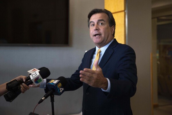 FILE - Miami Commissioner Alex DÌaz de la Portilla speaks at Miami City Hall in this undated photo. The city of Miami commissioner accused of bribery and money laundering was arrested Thursday, Sept. 14, 2023, on multiple corruption charges, officials said. (Miami Herald via AP, File)
