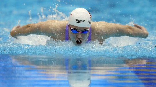 Zhang Yufei, of China, competes in the women's 100-meter butterfly final at the World Swimming Championships in Fukuoka, Japan, Monday, July 24, 2023. Zhang won gold. (AP Photo/Nick Didlick)