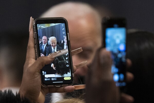 FILE - President Joe Biden is photographed by participants after delivering a speech commemorating Martin Luther King, Jr., Day, Monday, Jan. 16, 2023, in Washington. (AP Photo/Manuel Balce Ceneta, File)