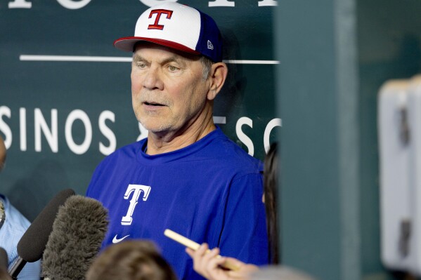 Texas Rangers manager Bruce Bochy speaks to the media before a baseball game against the Chicago Cubs, Thursday, March 28, 2024 in Arlington, Texas. (AP Photo/Gareth Patterson)