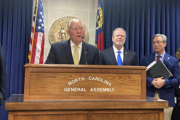North Carolina state Sen. Brent Jackson, R-Sampson, left, speaks at a Legislative Building news conference while Senate leader Phil Berger, R-Rockingham, center, and Sen. Michael Lee, R-New Hanover, watch, Monday, May 15, 2023, in Raleigh, N.C. Senate Republicans unveiled a two-year state government budget proposal. (AP Photo/Gary D. Robertson)