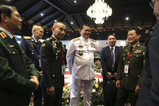 FILE - Indonesia's Adm. Yudo Margono, center, talks with Cambodia's Gen. Vong Pisen, second right, Thailand's Gen. Chalermphon Srisawasdi, third left, and Vietnam's senior Lt. Gen. Nguyen Tan Cuong, left, during the Association of Southeast Asian Nations (ASEAN) chiefs of defense forces meeting in Nusa Dua, Bali, Indonesia on June 7, 2023. Indonesia, the current chair of the Association of Southeast Asian Nations, said Tuesday, June 20, it was moving ahead with plans for joint naval exercises in September, the first-ever being held by the countries of the bloc on their own, which come at a time when several are taking stronger approaches to counter increasing Chinese assertiveness in the area. (AP Photo/Firdia Lisnawati, File)