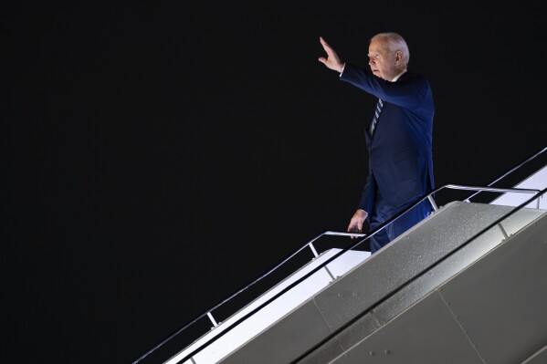 President Joe Biden arrives at Indira Gandhi International Airport to attend the G20 summit, Friday, Sept. 8, 2023, in New Delhi. (AP Photo/Evan Vucci)
