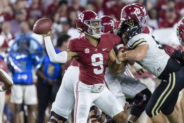 Alabama quarterback Bryce Young (9) throws a pass during the first half of the team's NCAA college football game against Vanderbilt, Saturday, Sept. 24, 2022, in Tuscaloosa, Ala. (AP Photo/Vasha Hunt)