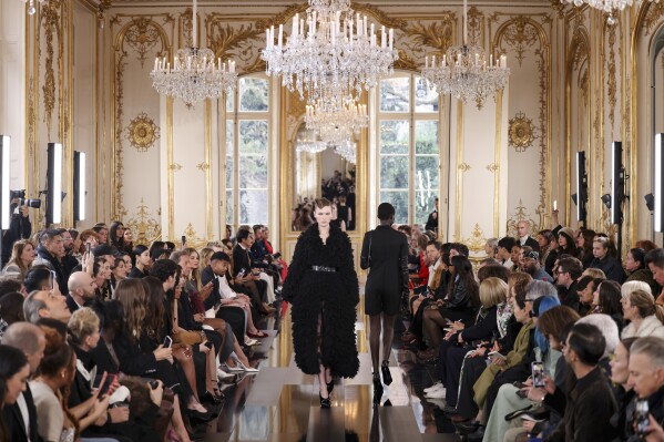 Paris Fashion Week: Valentino puts on opulent study in black, as McGirr unveils McQueen debut