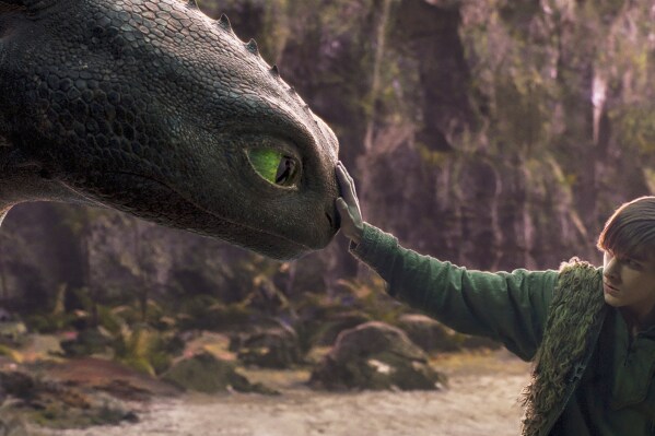 This image released by Universal Pictures shows Mason Thames in a scene from "How to Train Your Dragon.", (Universal Pictures via AP)