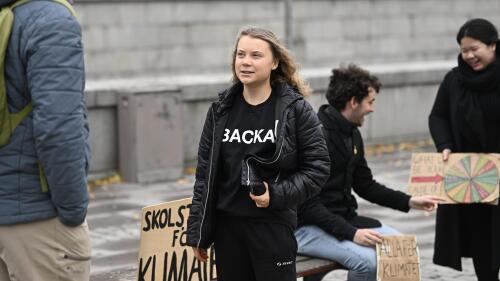 FILE - Climate activist Greta Thunberg arrives at the weekly Fridays for Future demonstration at the Mynttorget square next to the Swedish Parliament Riksdagen, in Stockholm, Sweden, on Nov. 11, 2022. Thunberg said Friday June 9, 2023 she will no longer be able to skip classes as a way to draw attention to climate change because she is graduating from high school. (Pontus Lundahl/TT News Agency via AP, File)