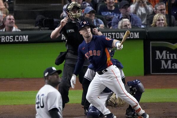 Houston Astros Alex Bregman (2) hits a solo homer during the third inning in Game 2 of baseball's American League Championship Series between the Houston Astros and the New York Yankees, Thursday, Oct. 20, 2022, in Houston. (AP Photo/Sue Ogrocki )