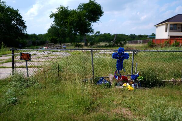 Candles, flowers and notes remain at the Makeshift Memorial Hall for the recently killed voice actor Jonathan Joss in San Antonio on Tuesday, June 3, 2025. (AP Photo/Eric Gay)