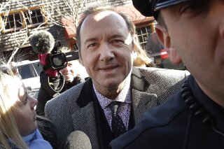 FILE - In this Jan. 7, 2019 file photo, actor Kevin Spacey arrives at district court in Nantucket, Mass. A young man who says Kevin Spacey groped him in a Nantucket bar in 2016 has dropped his lawsuit against the Oscar-winning actor. Mitchell Garabedian, an attorney for the man, announced in an email Friday, July 5,  that the suit filed June 26 in Nantucket Superior Court has been voluntarily dismissed.(AP Photo/Steven Senne)