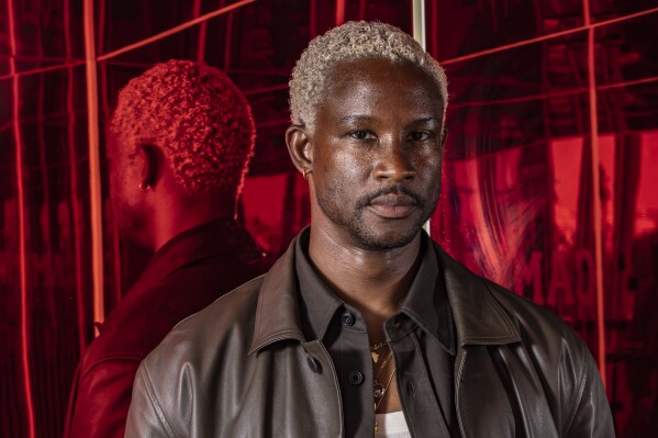 Director Akinola Davies Jr. poses for a portrait photograph for the film 'My Father's Shadow' at the 78th international film festival, Cannes, southern France, Monday, May 19, 2025. (Photo by Joel C Ryan/Invision/AP)