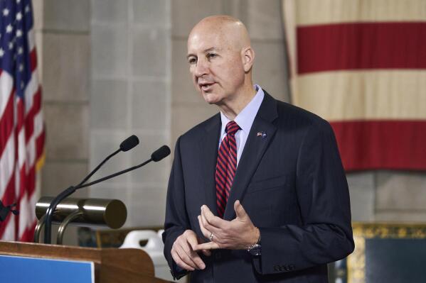 FILE - Nebraska Gov. Pete Ricketts speaks during a news conference, Sept. 30, 2020, in Lincoln, Neb. Nebraska took another step Wednesday, March 9, 2022, toward building a canal that would divert water out of neighboring Colorado under a 99-year-old compact, a project based in fears about the Denver area's growing use of the South Platte River that runs through both states. Republican Gov. Pete Ricketts announced the plan in January to invoke Nebraska's right to build the canal under the South Platte River Compact. (AP Photo/Nati Harnik, File)