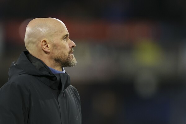 Manchester United's head coach Erik ten Hag leaves the field at the end of the English Premier League soccer match between Luton Town and Manchester United at Kenilworth Road, in Luton, England, Sunday, Feb. 18, 2024. (AP Photo/Ian Walton)