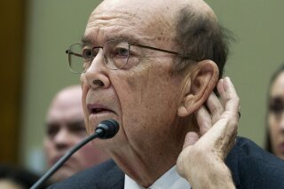 FILE - In this March 14, 2019 file photo Commerce Secretary Wilbur Ross testifies during the House Oversight Committee hearing on Capitol Hill in Washington. New evidence paints a "disturbing picture" that racial discrimination may be the motive behind the Trump administration's push to ask everyone in the country about citizenship status, a federal judge wrote in a filing, Monday, June 24, 2019. In his court filing, U.S. District Judge George Hazel of Maryland reasoned that new evidence "potentially connects the dots between a discriminatory purpose" and a decision by Commerce Secretary Wilbur Ross to add the citizenship question. (AP Photo/Jose Luis Magana, File)