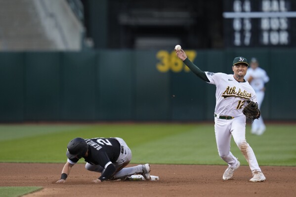 A's Tony Kemp, Sam Moll mark their first Father's Day as dads