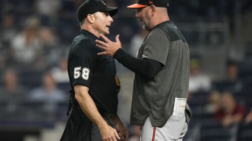 Baltimore Orioles manager Brandon Hyde, right, talks to home plate umpire Dan Iassogna, left, after being ejected from a baseball game during the eighth inning against the New York Yankees Thursday, July 6, 2023, in New York. (AP Photo/Frank Franklin II)
