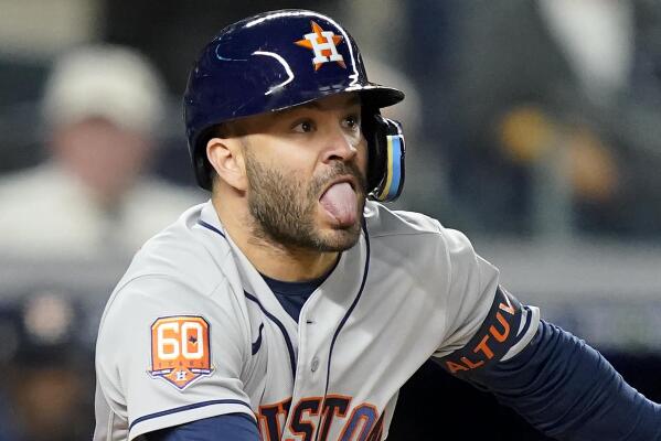 Astros star Jose Altuve ends 0-for-25 postseason skid | AP News