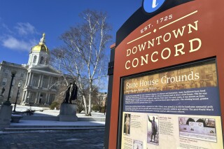A sign welcomes visitors to downtown Concord, N.H., and the Statehouse on Wednesday, Feb. 14, 2024. Lawmakers are considering a bill to amend state law to include an official pronunciation of the capital city. (AP Photo/Holly Ramer)