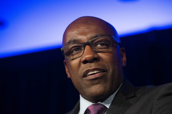 
              FILE--In this Nov. 2018 file photo, Illinois Attorney General Elect Kwame Raoul address the crowd at his election night party, in Chicago. The Illinois Supreme Court has let stand a less than seven year prison sentence for a white Chicago police officer convicted of killing black teenager Laquan McDonald that some critics characterized as a slap on the wrist. A Tuesday, March 19, 2019 decision denies a bid by Illinois attorney general Kwame Raoul and a special prosecutor to resentence Jason Van Dyke. The February request focused on highly legalistic issues surrounding sentencing guidelines. (Tyler LaRiviere/Chicago Sun-Times via AP, File)
            
