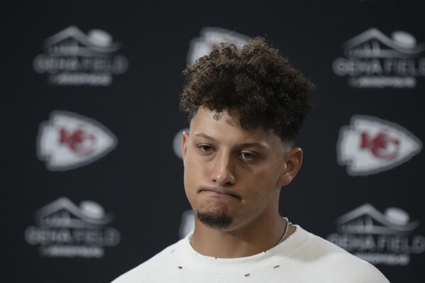 Kansas City Chiefs quarterback Patrick Mahomes pauses during a news conference following an NFL football game against the Detroit Lions Thursday, Sept. 7, 2023, in Kansas City, Mo. The Lions won 21-20. (AP Photo/Charlie Riedel)