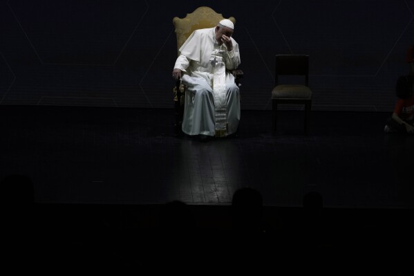 Pope Francis gestures as he attends an annual gathering of pro-family organisations at the Auditorium della Conciliazione, in Rome, Friday, May 10, 2024. (AP Photo/Alessandra Tarantino)