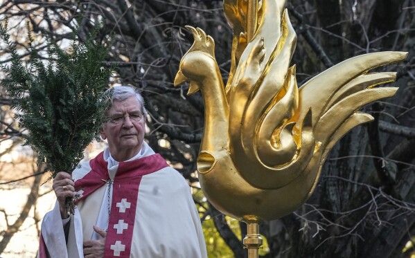 New Golden Rooster Fitted To Spire Of Paris' Notre Dame Cathedral