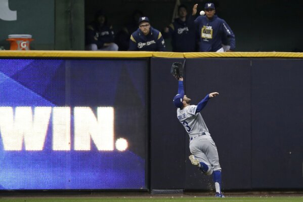 Dodgers finish off Brewers in 7 games to win NL pennant