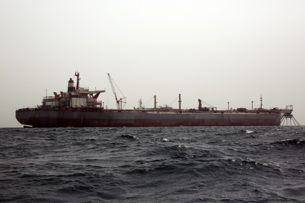 FILE - The 'Safer' tanker is seen on Monday, June 12, 2023, off the coast of Yemen. A senior United Nations official says a salvage team is set to begin siphoning oil out of the decaying tanker moored off the coast of Yemen. (AP Photo/Osamah Abdulrahman, File)