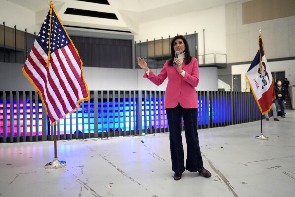 Republican presidential candidate former UN Ambassador Nikki Haley speaks at a caucus site at Franklin Junior High in Des Moines, Iowa on Monday. (AP Photo/Carolyn Kaster)
