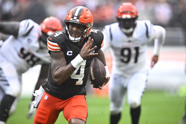 Cleveland Browns quarterback Deshaun Watson (4) runs for a touchdown against the Cincinnati Bengals during the first half of an NFL football game Sunday, Sept. 10, 2023, in Cleveland. (AP Photo/David Richard)