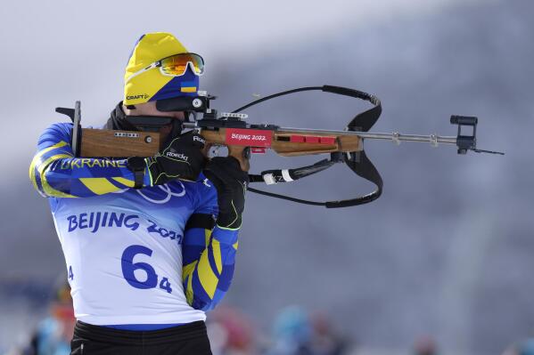 Dmytro Pidruchnyi of Ukraine shoots during zeroing in the men's 4x7.5-kilometer relay at the 2022 Winter Olympics, Tuesday, Feb. 15, 2022, in Zhangjiakou, China. (AP Photo/Kirsty Wigglesworth)