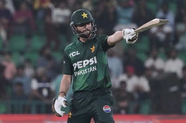 Pakistan's Salman Ali Agha celebrates after scoring fifty during the first Twenty20 cricket match between Pakistan and Bangladesh, in Lahore, Pakistan, Wednesday, May 28, 2025. (AP Photo/K.M. Chaudary)