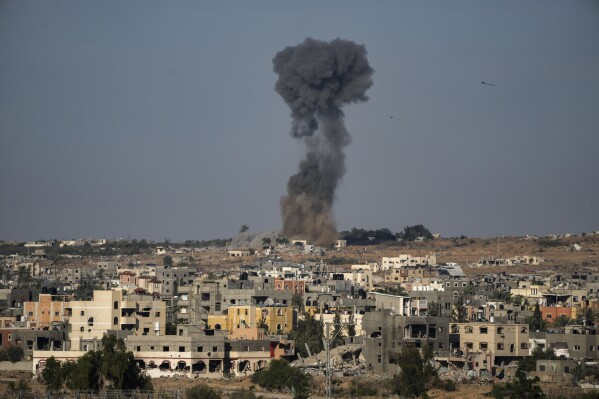 Smoke rises from an Israeli airstrike in Rafah, southern Gaza Strip, Friday, May 31, 2024. (AP Photo/Abdel Kareem Hana)