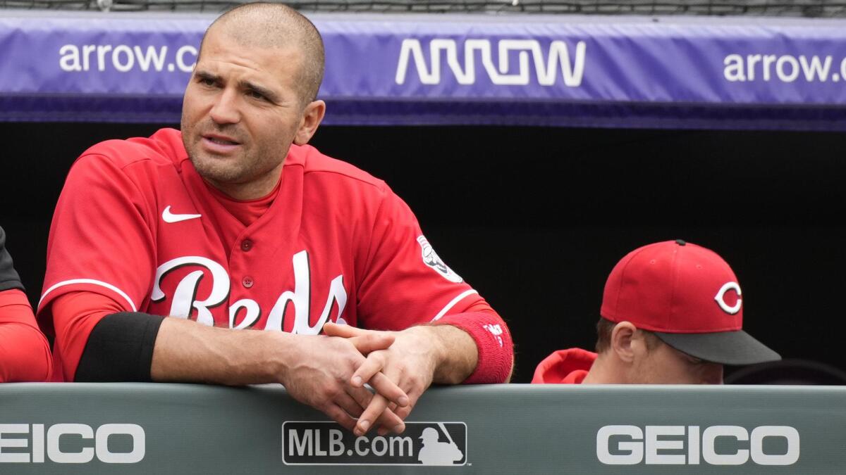 Reds put slumping Votto on COVID-19 injured list