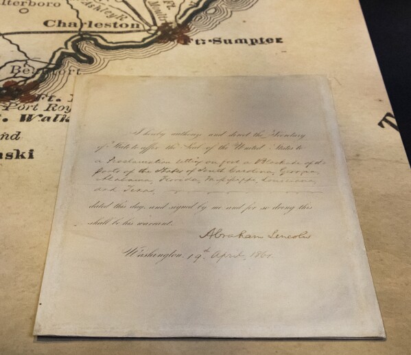 This photo provided by the Abraham Lincoln Presidential Library and Museum shows a document signed by President Lincoln in April 1861 ordering the blockade of southern United States ports after the Confederate attack on Fort Sumter started the Civil War. Illinois Gov. J.B. Pritzker and first lady M.K. Pritzker will visit the Abraham Lincoln Presidential Library and Museum Tuesday, April 30, 2024 to donate the documents signed by Lincoln. (Abraham Lincoln Presidential Library and Museum via AP)