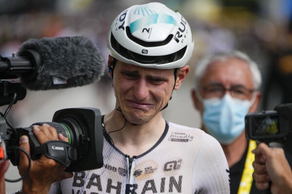 Matej Mohorič fights tears after winning Tour de France 19th stage by 0.004  seconds