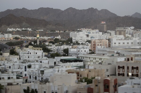 FILE - A general view of the city, in Muscat, Oman, on Sept. 15, 2010. This week's attack on a Shiite mosque in the capital stunned Oman, a quiet nation long spared militant violence. It underscores how the Islamic State group has turned to a strategy of surprise, dramatic strikes outside its usual battlegrounds — a way to show its resilience and inspire new recruits. (ĢӰԺ Photo/Kamran Jebreili, File)