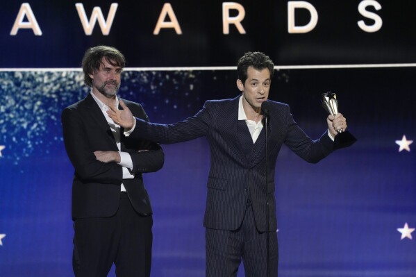 Andrew Wyatt, left, and Mark Ronson, accept the award for best song for "I'm Just Ken" from "Barbie" during the 29th Critics Choice Awards on Sunday, Jan. 14, 2024, at the Barker Hangar in Santa Monica, Calif. (AP Photo/Chris Pizzello)