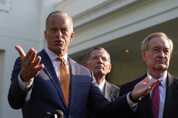 Senate Majority Leader John Thune, R-S.D., flanked by Sen. John Barrasso, R-Wyo., center, and Sen. Mike Crapo, R-Idaho, speak with reporters after meeting with President Donald Trump at the White House, June 4, 2025, in Washington. (AP Photo/Alex Brandon, file)