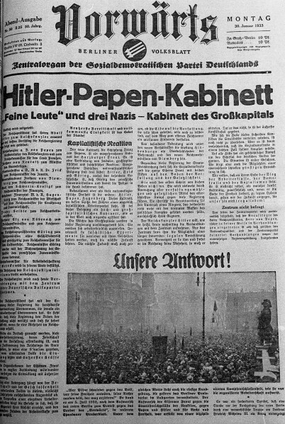 Image shows the front page of the German national newspaper "Vorwärts" (Ahead) from Monday, January 30, 1933, reporting on the formation of the new German Cabinet with Hitler as Chancellor and von Hindenburg as president, with a photo of Nazis and citizens at the Lustgarten yesterday in Berlin January 29, 1933. (AP Photo)