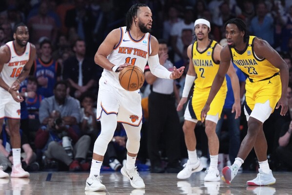 New York Knicks guard Jalen Brunson (11) dribbles during the first half of Game 7 in an NBA basketball second-round playoff series against the Indiana Pacers, Sunday, May 19, 2024, in New York. The Pacers won 130-109. (AP Photo/Julia Nikhinson)