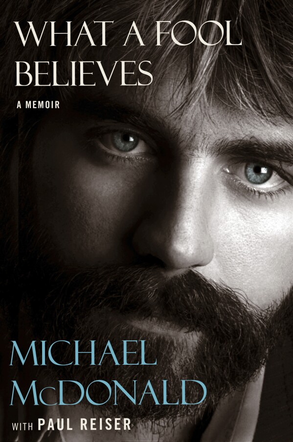 This cover image released by Dey Street shows "What a Fool Believes" by Michael McDonald with Paul Reiser. (Dey Street via AP)