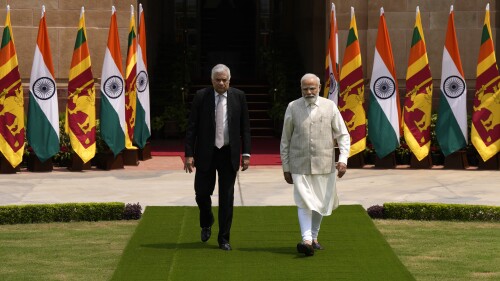 Indian Prime Minister Narendra Modi welcomes Sri Lankan President Ranil Wickremesinghe walk for a photo call before their delegation level meeting in New Delhi, India, Friday, July 21, 2023. (AP Photo/Manish Swarup)