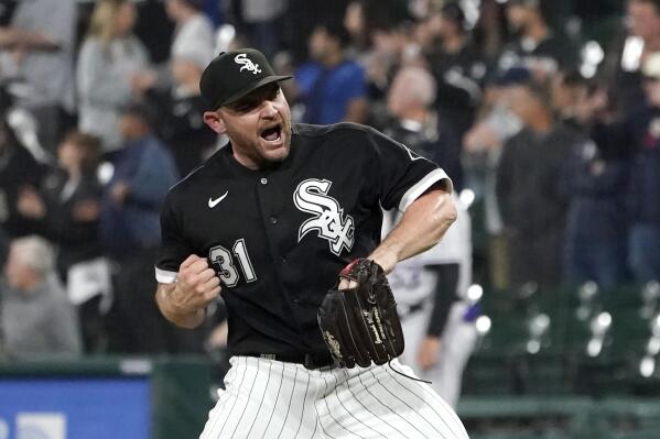 FILE - Chicago White Sox relief pitcher Liam Hendriks celebrates the team's 4-2 win over the Colorado Rockies in a baseball game Tuesday, Sept. 13, 2022, in Chicago. Chicago White Sox closer Hendriks says he has non-Hodgkin’s lymphoma. Hendriks announced Sunday, Jan. 8, 2023, on Instagram that he was diagnosed in recent days. The three-time All-Star was scheduled to begin treatment on Monday. (AP Photo/Charles Rex Arbogast, File)