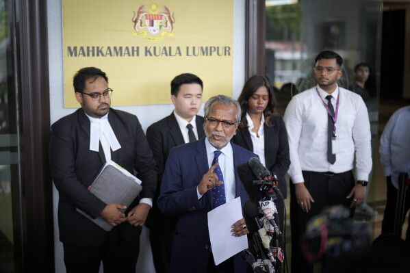 Shafee Abdullah, lawyer for former Prime Minister Najib Razak speaks during a news conference on the Pardons Board's decision last week to commute Najib's 12-year jail sentence and fine at court house in Kuala Lumpur, Malaysia Wednesday, Feb. 7, 2024. Najib Razak is disappointed he wasn't given a full royal pardon of his 12-year prison sentence for graft, and may file a new appeal to the new monarch, his lawyer said Wednesday. (AP Photo/Vincent Thian)